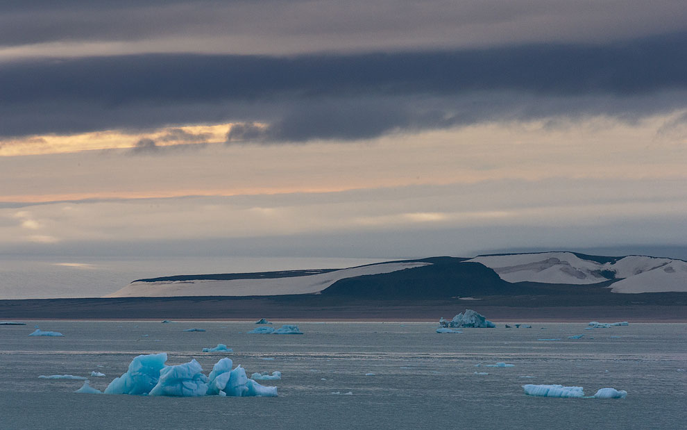 Iceberg broken off from Austfonna Glacier, Nordaustlandet Island, Svalbard (Spitsbergen) Archipelago, Norway.