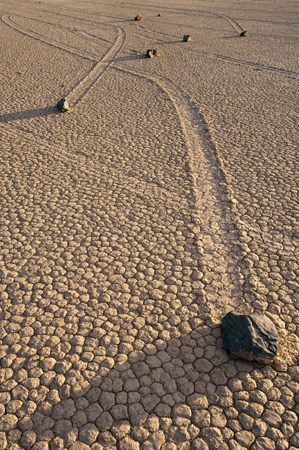 Racing. Moving rocks and tracks on dry lake bad of Racetrack Playa. Death Valley National Park, California, USA. - Death-Valley-National-Park-California-USA - Mike Reyfman Photography