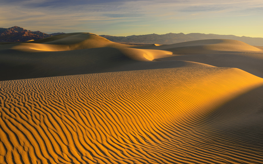 Mesquite Flats Sunrise. Mesquite Flats Sand Dunes and Amargosa Range, Stovepipe Wells, Death Valley, California. - Death-Valley-National-Park-California-USA - Mike Reyfman Photography