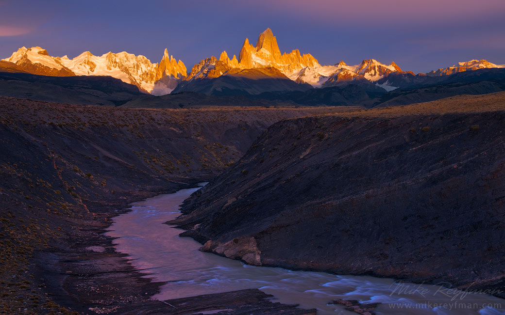 Mountain magic. Fitzroy and Cerro Torre massifs at Sunrise from Las Vueltas River canyon overlook. Patagonian Andes, Santa Cruz, Argentina.
