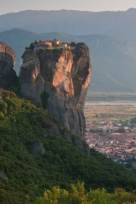 Holy Trinity Monastery (Agia Trias) in the Meteora with the town of Kalambaka on Thessaly valley floor. Greece.
