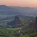 Roussanou and St. Nicholas Anapafsas Monasteries with town of Kastraki on Thessaly valley floor at sunset. Meteora, Greece - Meteora-Monasteries-Greece - Mike Reyfman Photography