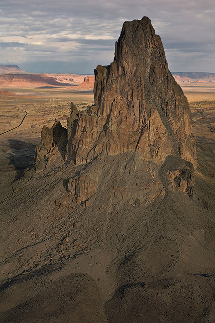 Aerial view of Agathla Peak (El Capitan) and US 163 south of Monument Valley, Arizona, USA. - Monument-Valley-Agathla-Peak-El-Capitan-Owl-Church-Rock - Mike Reyfman Photography