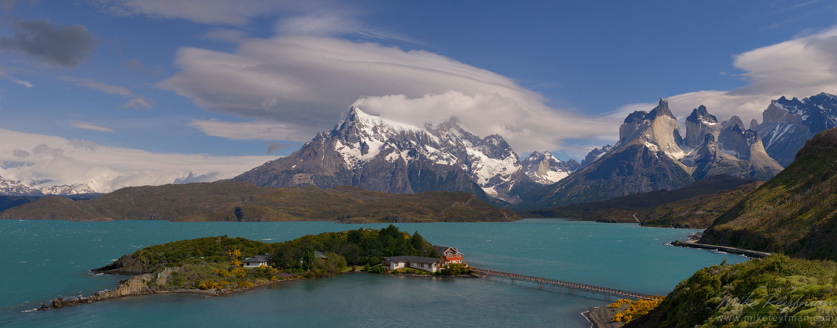 Hosteria Pehoe, Lago Pehoe and Cordillera del Paine as seen from Mirador Condores. Torres del Paine National Park, Ultima Esperanza Province, Magallanes and Antartica Chilena Region XII, Patagonia, Chile.