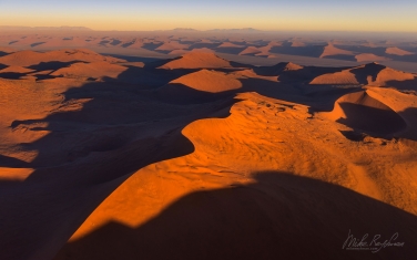 067-SV_10N2394 Aerial View of Orange Sand Dunes in the Namib Desert. Sossusvlei, Namib-Naukluft National Park, Namibia.