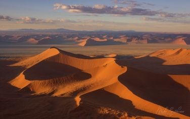 085-SV_10P8256 Aerial View of Orange Sand Dunes in the Namib Desert. Sossusvlei, Namib-Naukluft National Park, Namibia.