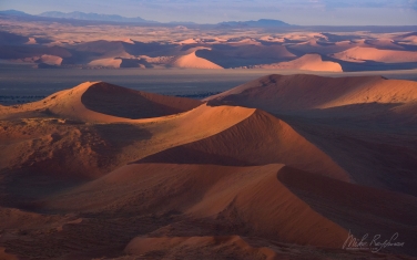 086-SV_10P8241 Aerial View of Orange Sand Dunes in the Namib Desert. Sossusvlei, Namib-Naukluft National Park, Namibia.