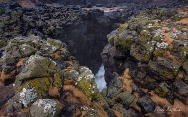 072-IC-CL_10P4653 Blowhole Basalt Sea Cliffs. Arnarstapi nature preserve, Snaefellsness Peninsula, Iceland.