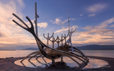 101-IC-CL_O3X1032 Sun Voyager (Solfar), a Viking ship metal sculpture by artist Jon Gunnar Arnason, at the shore of Reykjavik, Iceland, built as an ode to the sun.