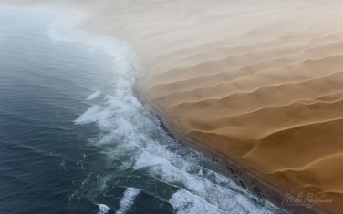 SCW_006_10P8438 Where two oceans meet. Atlantic Ocean and sand dunes of the Skeleton Coast. Namib Skeleton Coast National Park, Namibia