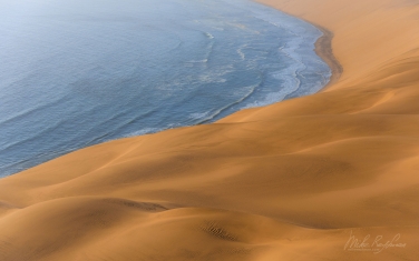 SCW_026_10N3102 Atlantic Ocean and Sand Dunes. Namib Skeleton Coast National Park, Namibia