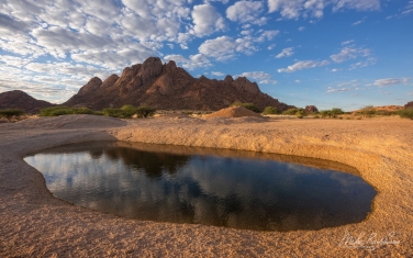 S-NR-QT_007_10R9906 Bold granite outcrops of Spitzkoppe Massif reflected in the small pond. Spitzkoppe, Southern Damaraland, Erongo, Namibia