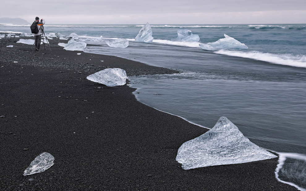 The Global Warming Chronicles. Icebergs on the ocean coast near Jokulsarlon Glacial Lagoon, Iceland.