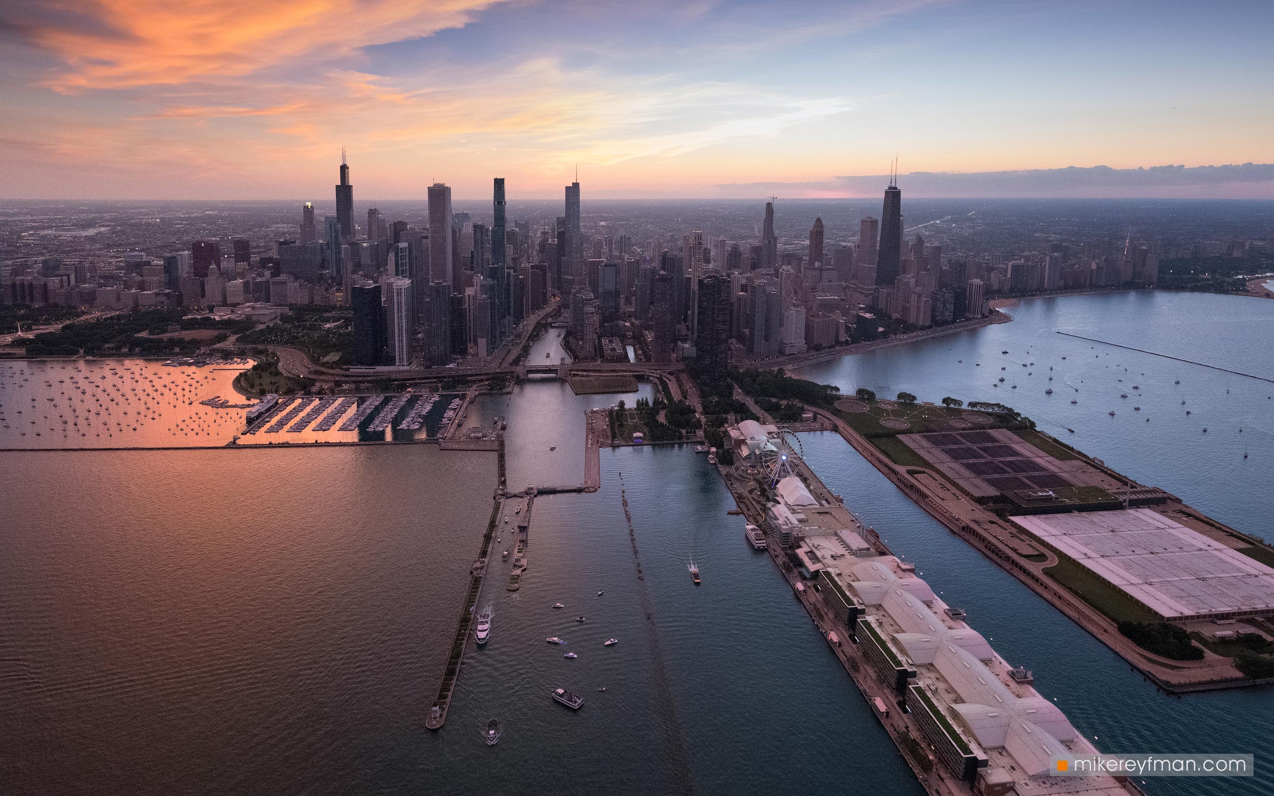 Aerial view of Chicago Skyline with Chicago Harbour and Navy Pier in the foreground. Chicago, Illinois, USA. 058-CH-2_50F1987 - Ever-beating architectural heart of America. The birthplace of the most iconic buildings in the country. - Mike Reyfman Photography