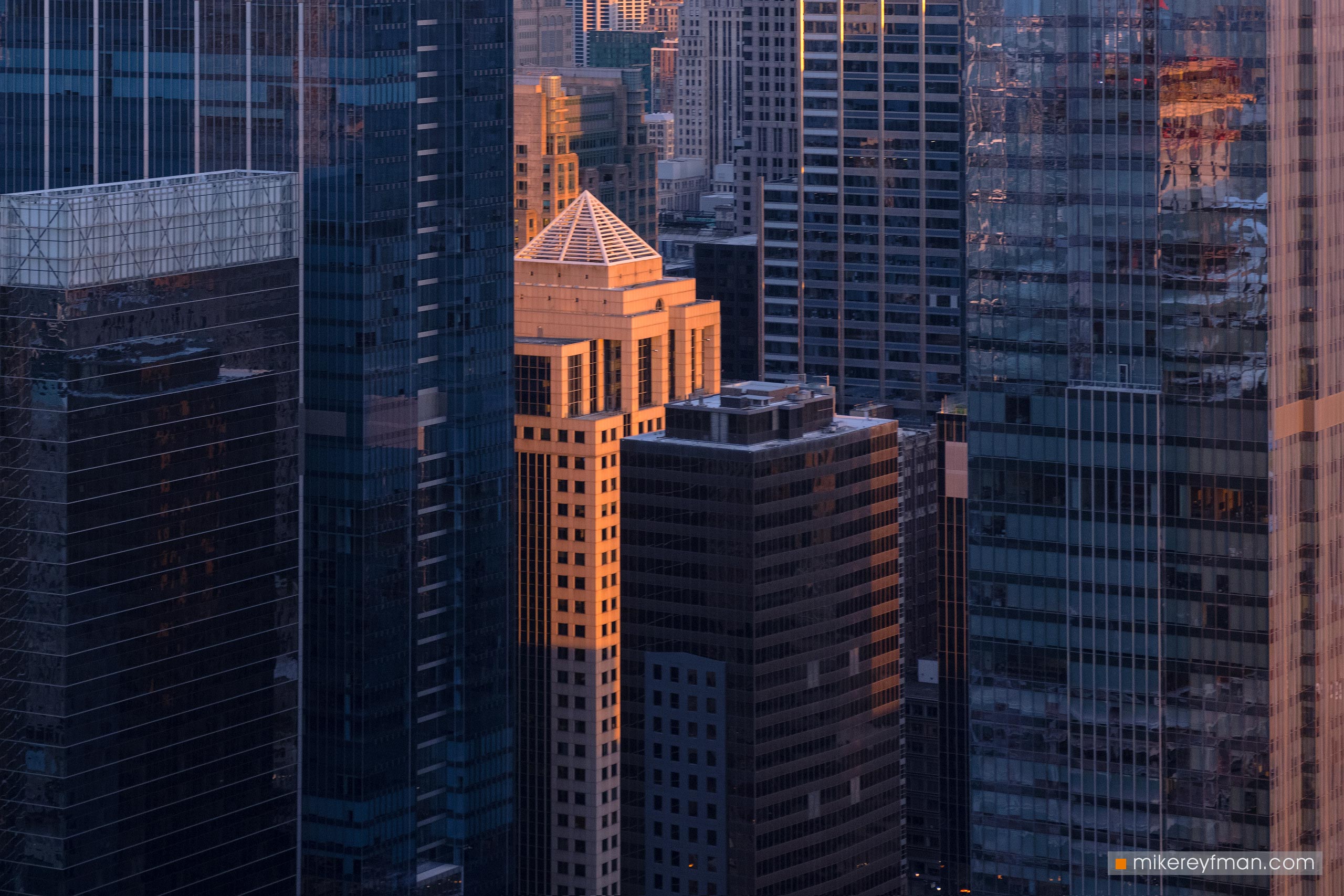 City from above - Chicago, Illinois, USA. Aerial view in the evening. 060-CH-2_ZRA10070 - Ever-beating architectural heart of America. The birthplace of the most iconic buildings in the country. - Mike Reyfman Photography
