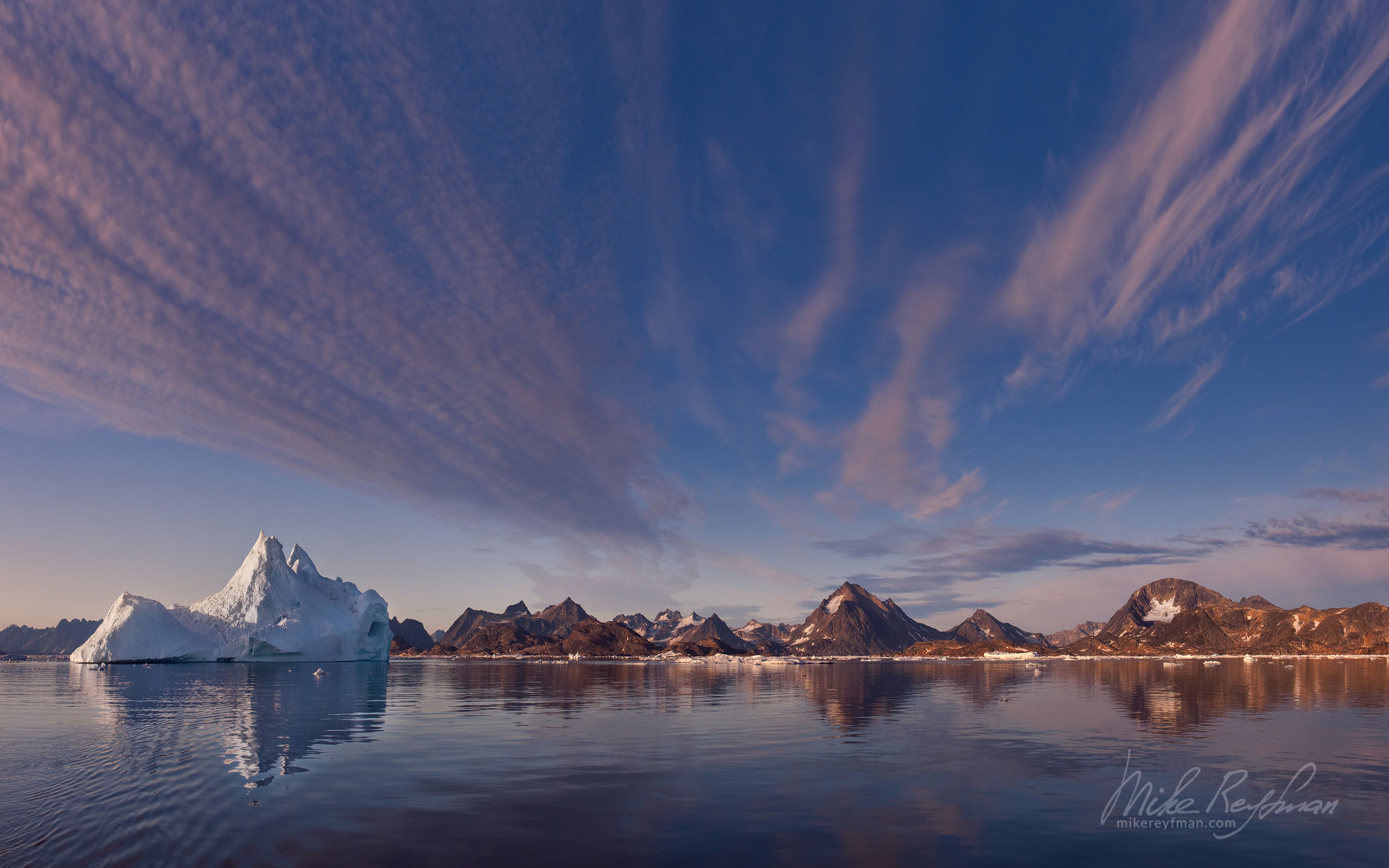 Iceberg by the shores of Ammassalik island. Southeastern Greenland. 012-GR-KU_P3X5471-75 - Kulusuk island, Ammassalik Fjord & Torsuut Tunoq Sound. Southeastern Greenland - Mike Reyfman Photography