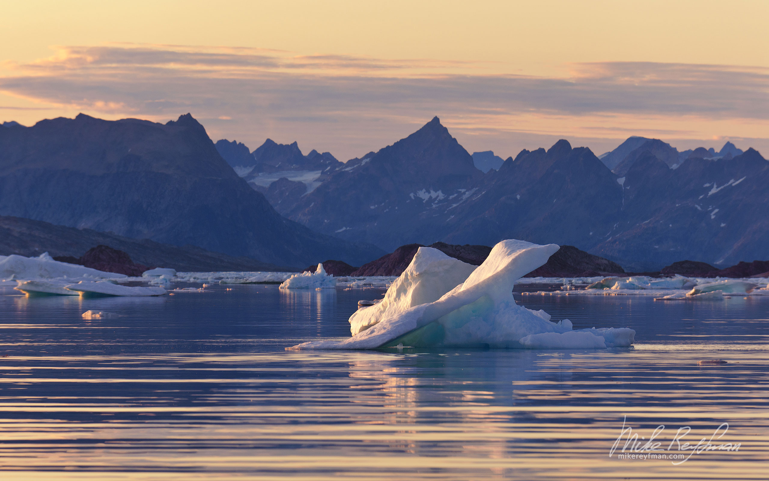 Iceberg by the shores of Ammassalik island. Southeastern Greenland. 013-GR-KU_P3X5596 - Kulusuk island, Ammassalik Fjord & Torsuut Tunoq Sound. Southeastern Greenland - Mike Reyfman Photography