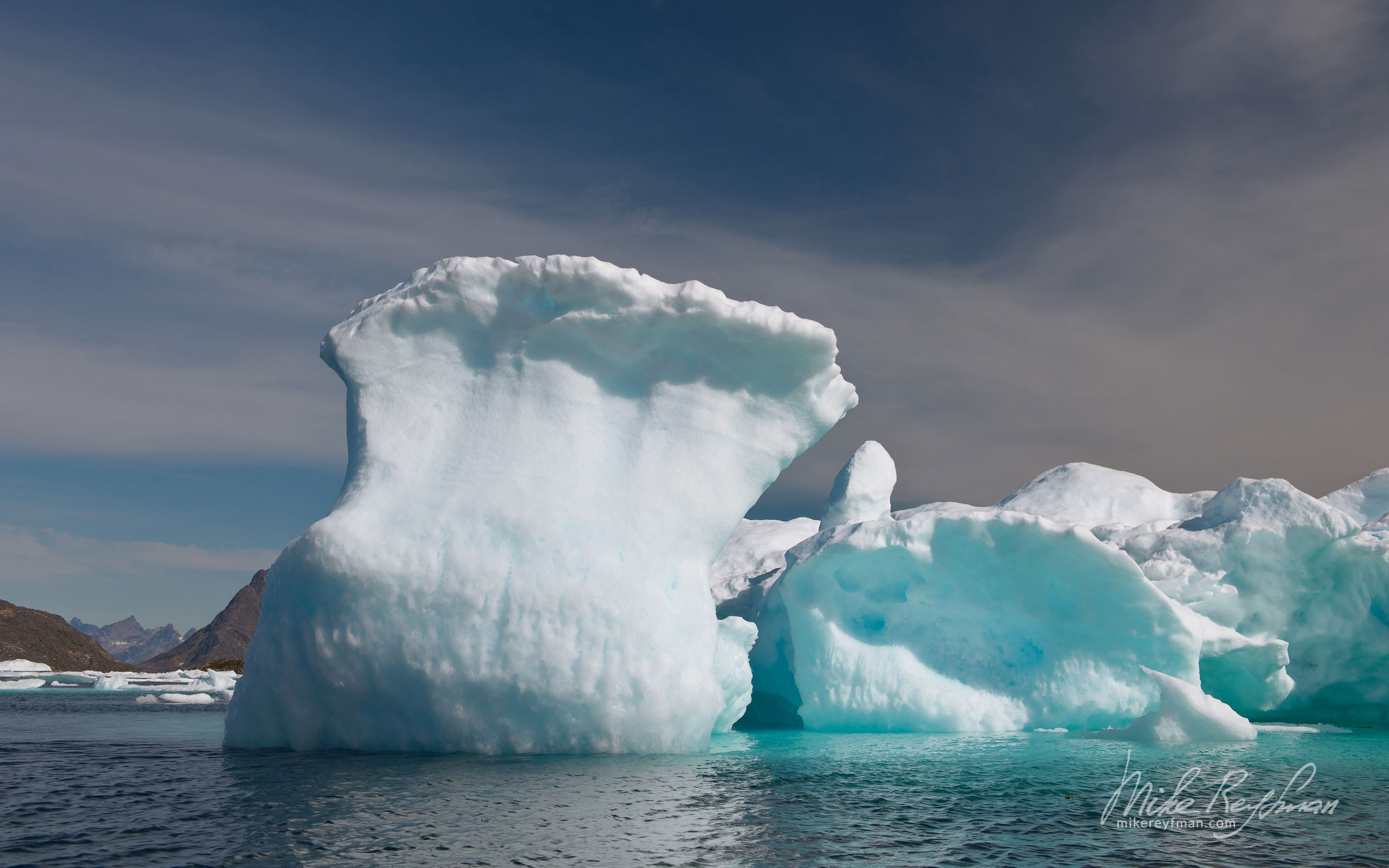 Frozen wave. Iceberg offshore Southeastern Greenland. 015-GR-KU_P3X5249 - Kulusuk island, Ammassalik Fjord & Torsuut Tunoq Sound. Southeastern Greenland - Mike Reyfman Photography