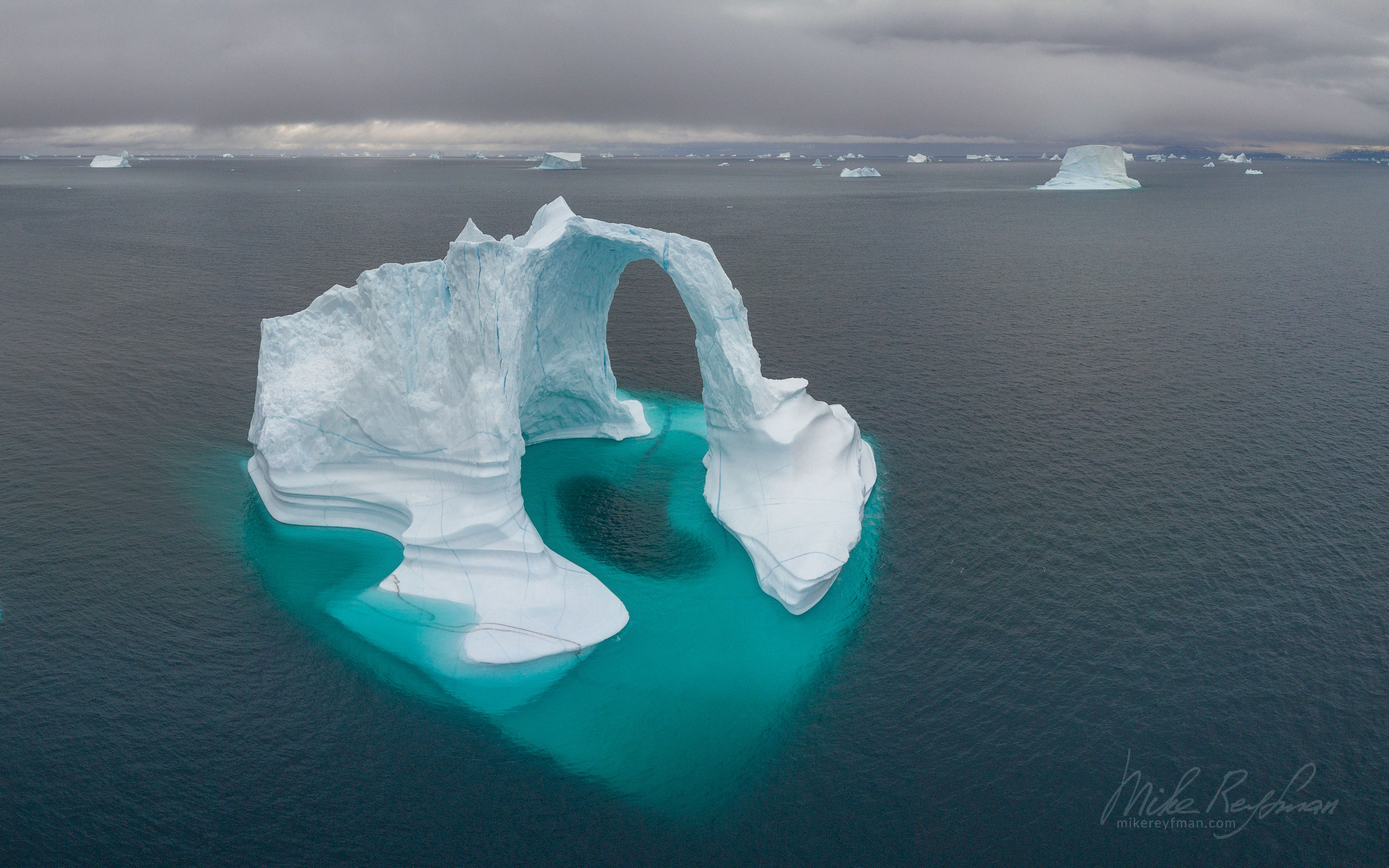 Iceberg in Scoresby Sund. Greenland. Aerial. 064-GR-SC_DJI_0466 - The Scoresby Sund fjord system and the settlement of Ittoqqortoormiit. East Greenland. - Mike Reyfman Photography