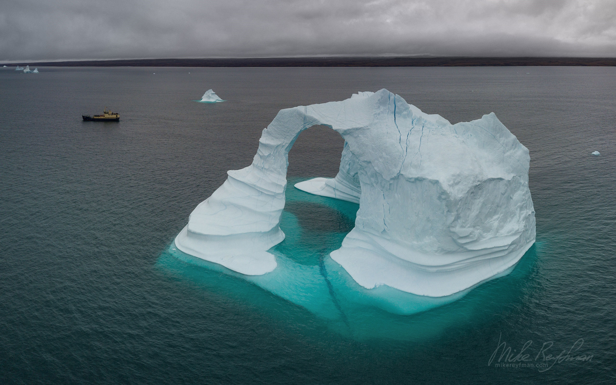 Iceberg in Scoresby Sund. Greenland. Aerial. 065-GR-SC_DJI_0485 - The Scoresby Sund fjord system and the settlement of Ittoqqortoormiit. East Greenland. - Mike Reyfman Photography