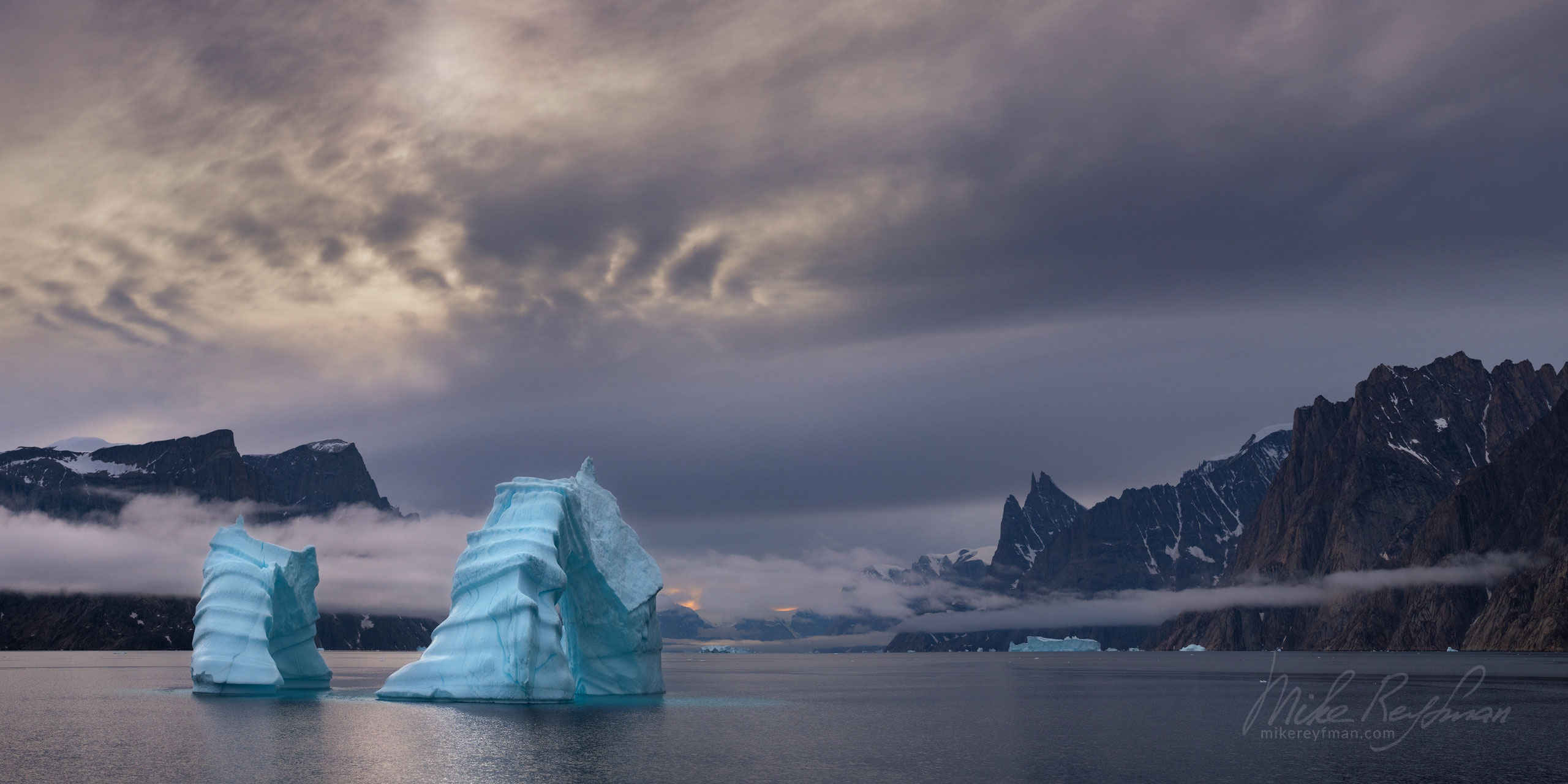 Icebergs in Scoresby Sund. Greenland. 070-GR-SC_50B7684_Pano-1x2 - The Scoresby Sund fjord system and the settlement of Ittoqqortoormiit. East Greenland. - Mike Reyfman Photography