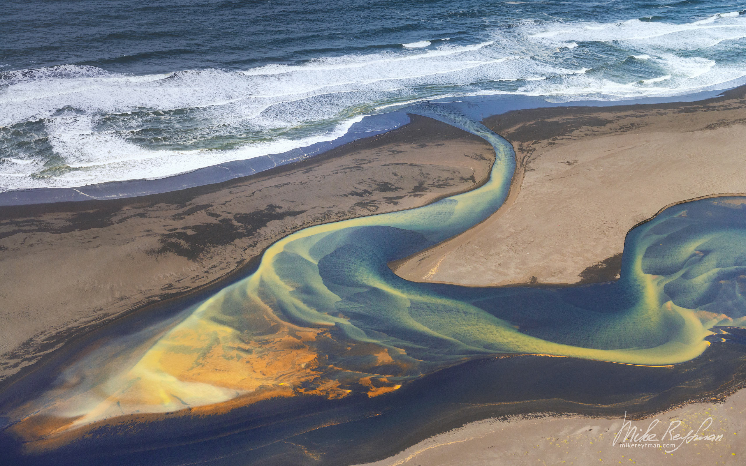 Aerial view of multicolored glacial river floating into the Atlantic Ocean. Eastern Iceland. IC-CL AR-4 _D8B6788 - Where Lava Meets the Ocean. Iceland coastline. - Mike Reyfman Photography