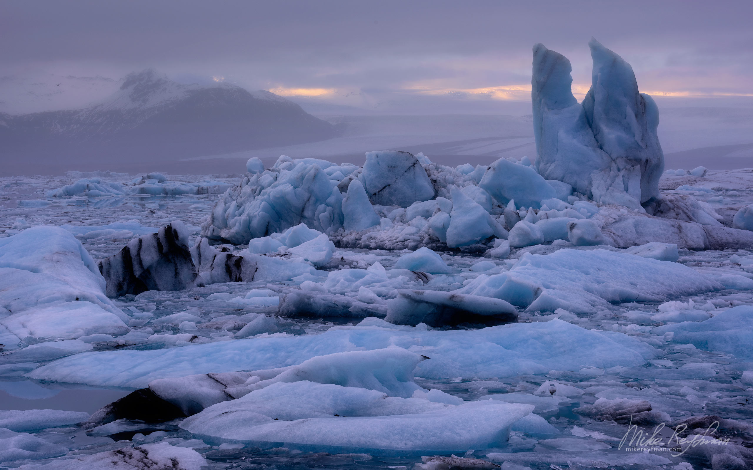 Icebergs in the Jokulsarlon (Jökulsárlón) glacial lagoon. Breiðamerkurjökull glacier, Vatnajökull National Park, Iceland, South coast IC-ICE 040 _10P3476 - Where Lava Meets the Ocean. Iceland coastline. - Mike Reyfman Photography