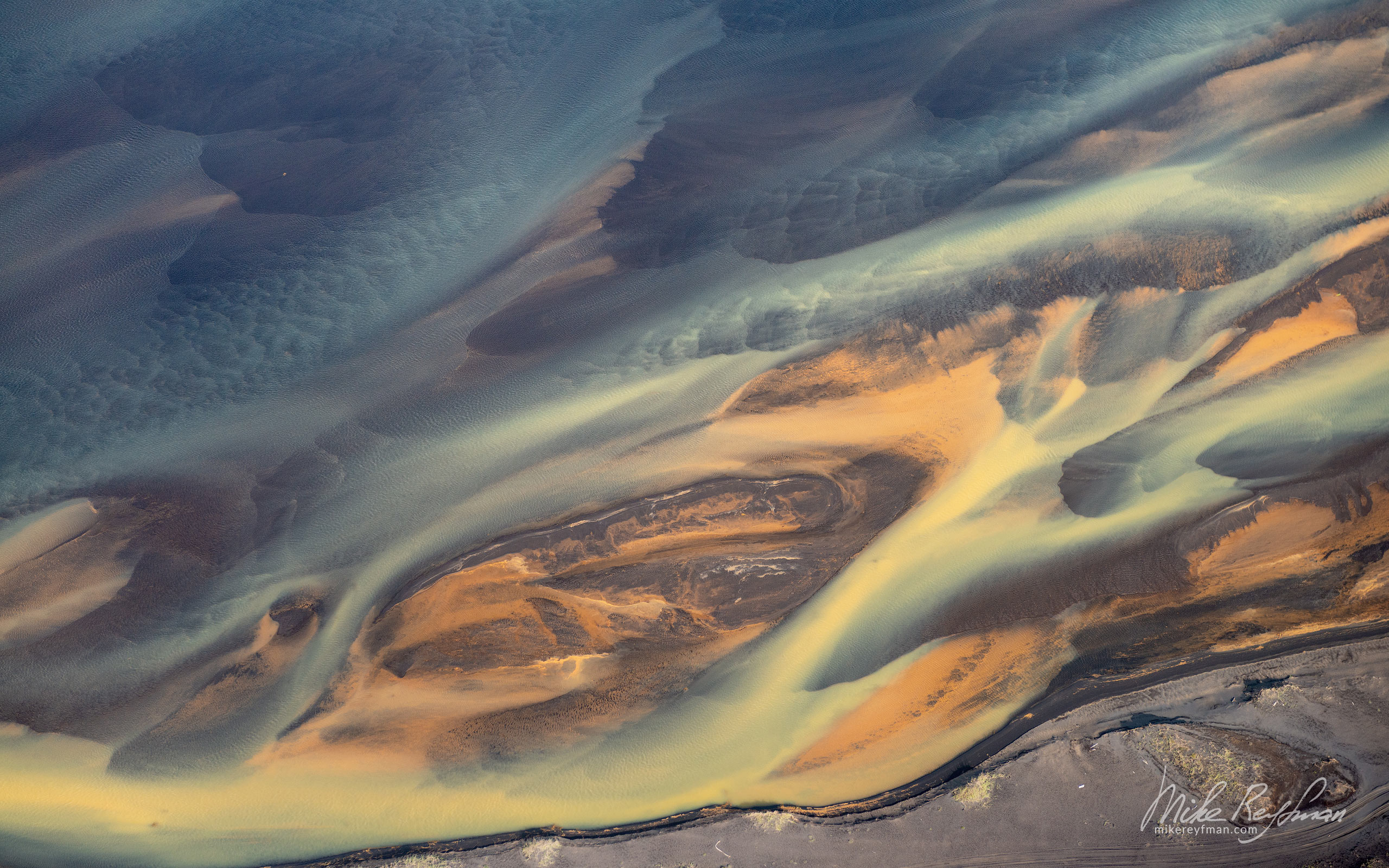 Aerial view of a multicolored glacial river. Southeastern Iceland. IC-CL AR-15 _D8B6609 - Rhyolite Mountains, Crater Lakes, Geothermal Areas, Lava Fields and Glacial Rivers. Iceland.  - Mike Reyfman Photography
