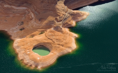 Natural-Pool.-Glen-Canyon-NRA,-Lake-Powell,-Utah/Arizona,-US.-Aerial.