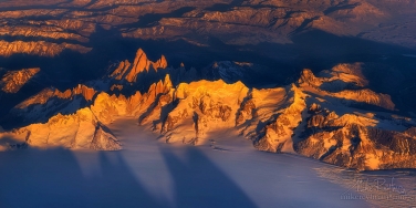 Granite-spires-of-Cerro-Torre-and--Fitzroy-massifs-at-sunset.-Viedma-Glacier---the-part-of-the-Southern-Patagonia-ice-cap-on-the-foreground.-Taken-on-the-LAN-flight-from-Río-Gallegos-to-Punta-Arenas.